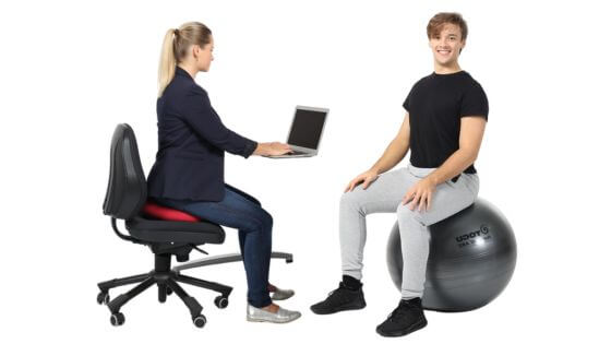 The correct sitting position at the desk